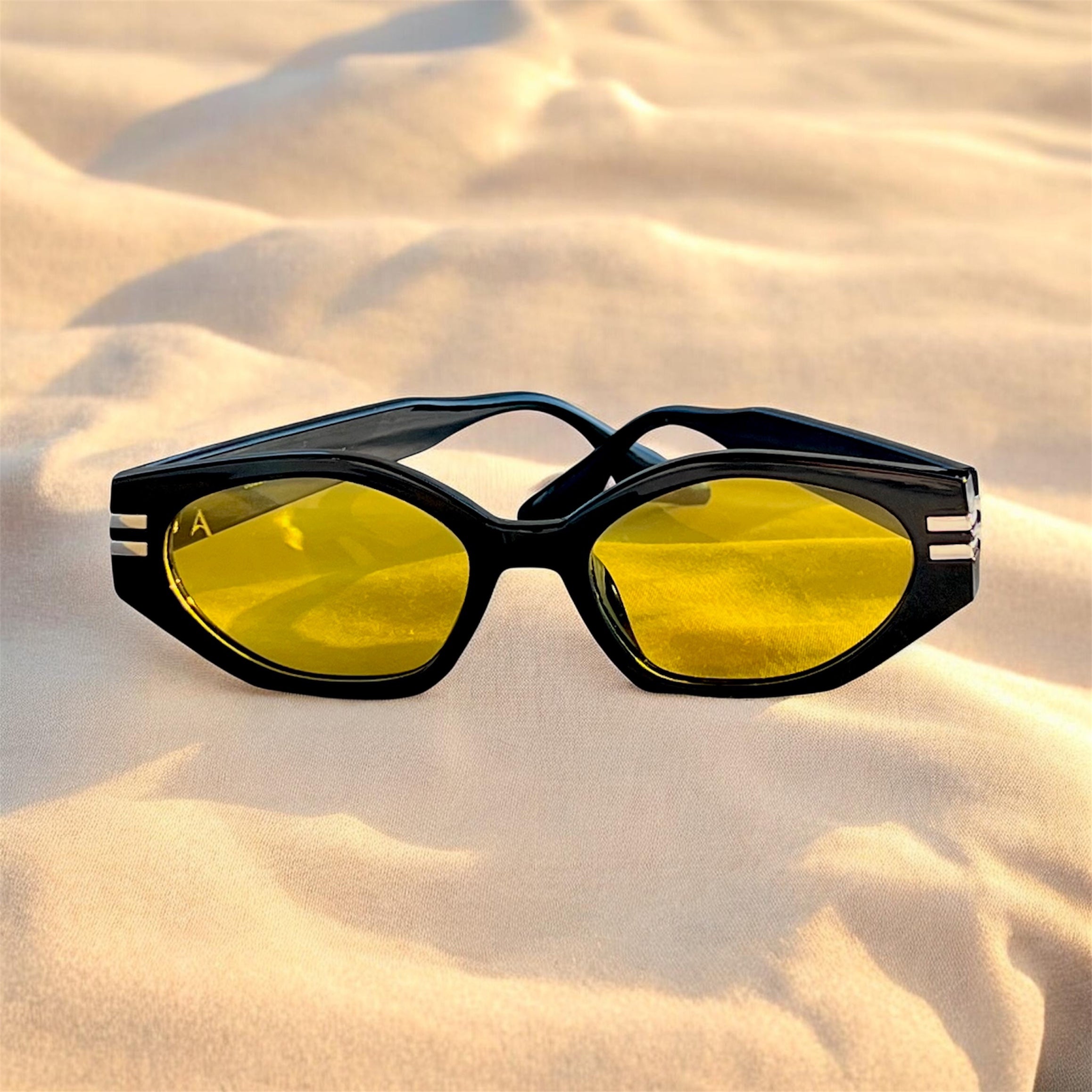 Black sunglasses with yellow lenses